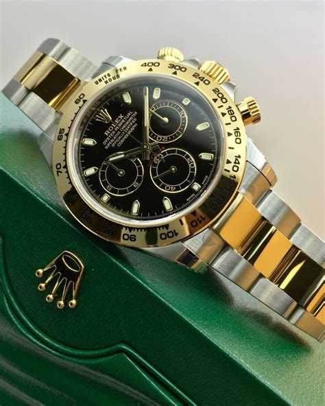 daytona rolex black face gold|Rolex daytona steel black dial.